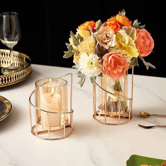 Gold colored metal candlestick holder with removable glass cover, doubles as flower vase 